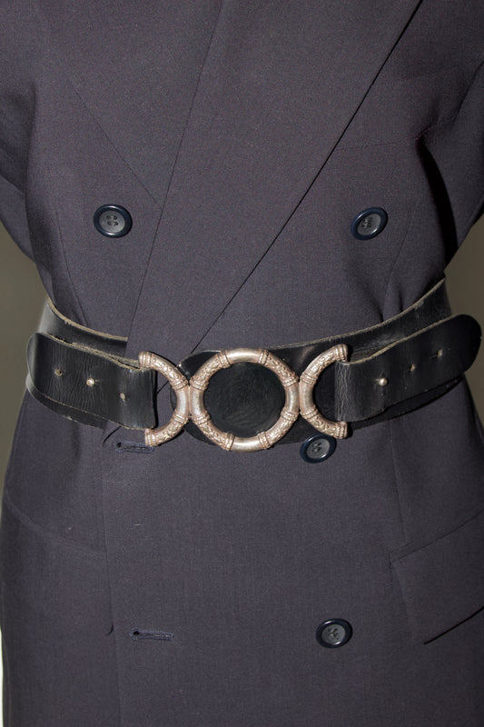 Vintage black leather belt with silver coloured buckle