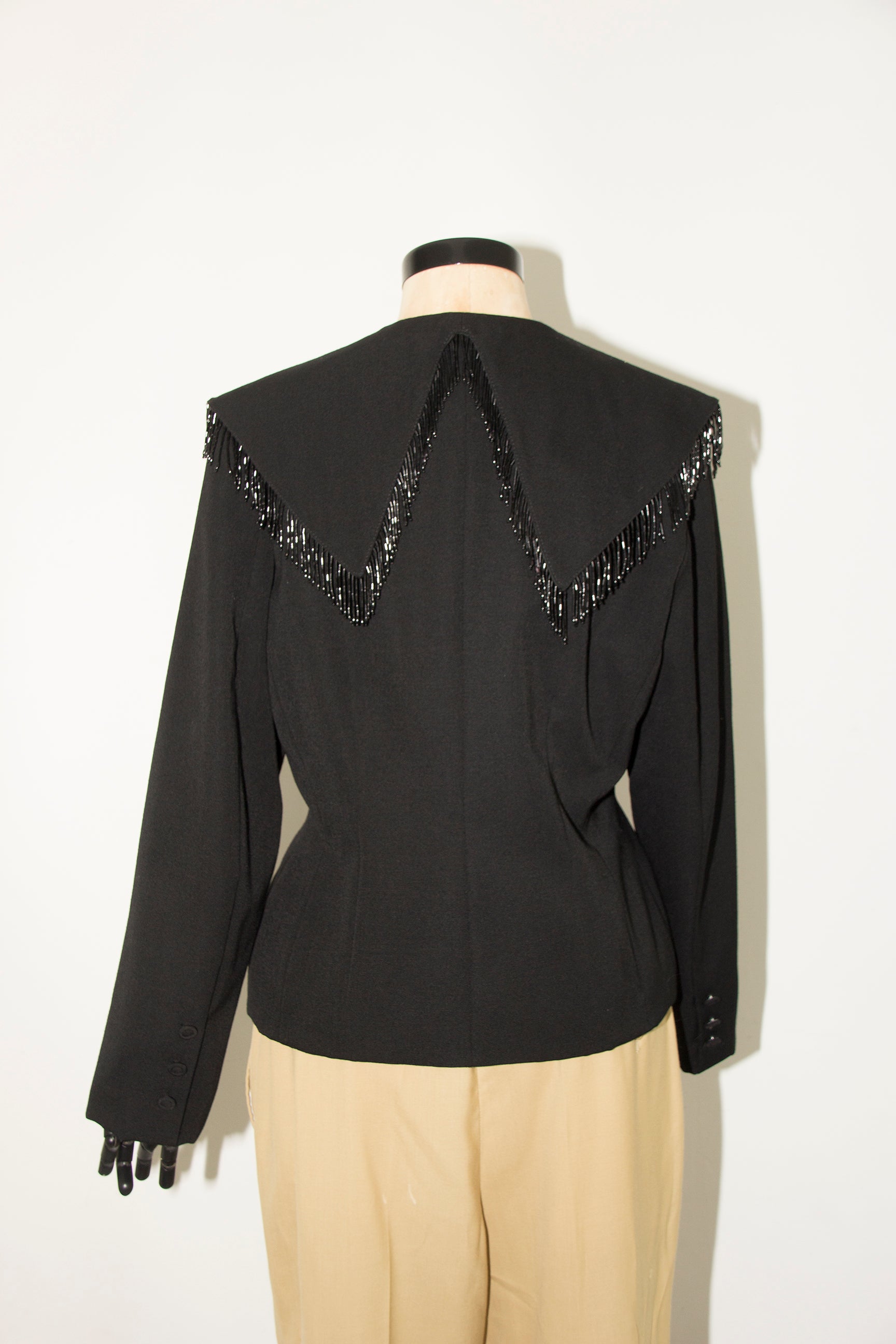 COUTURE BLACK JACKET WITH FRINGES